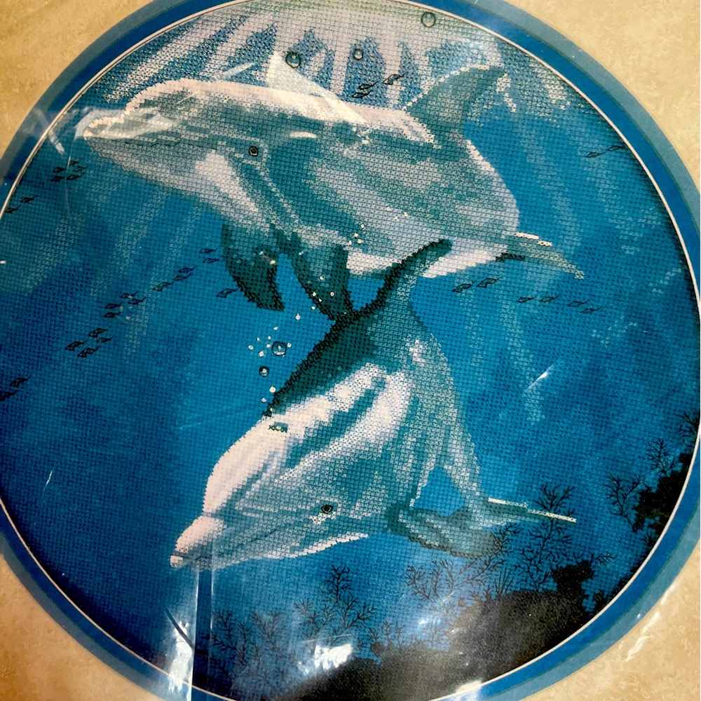 Dolphins counted cross stitch Candamar Designs 12” Round finished size.